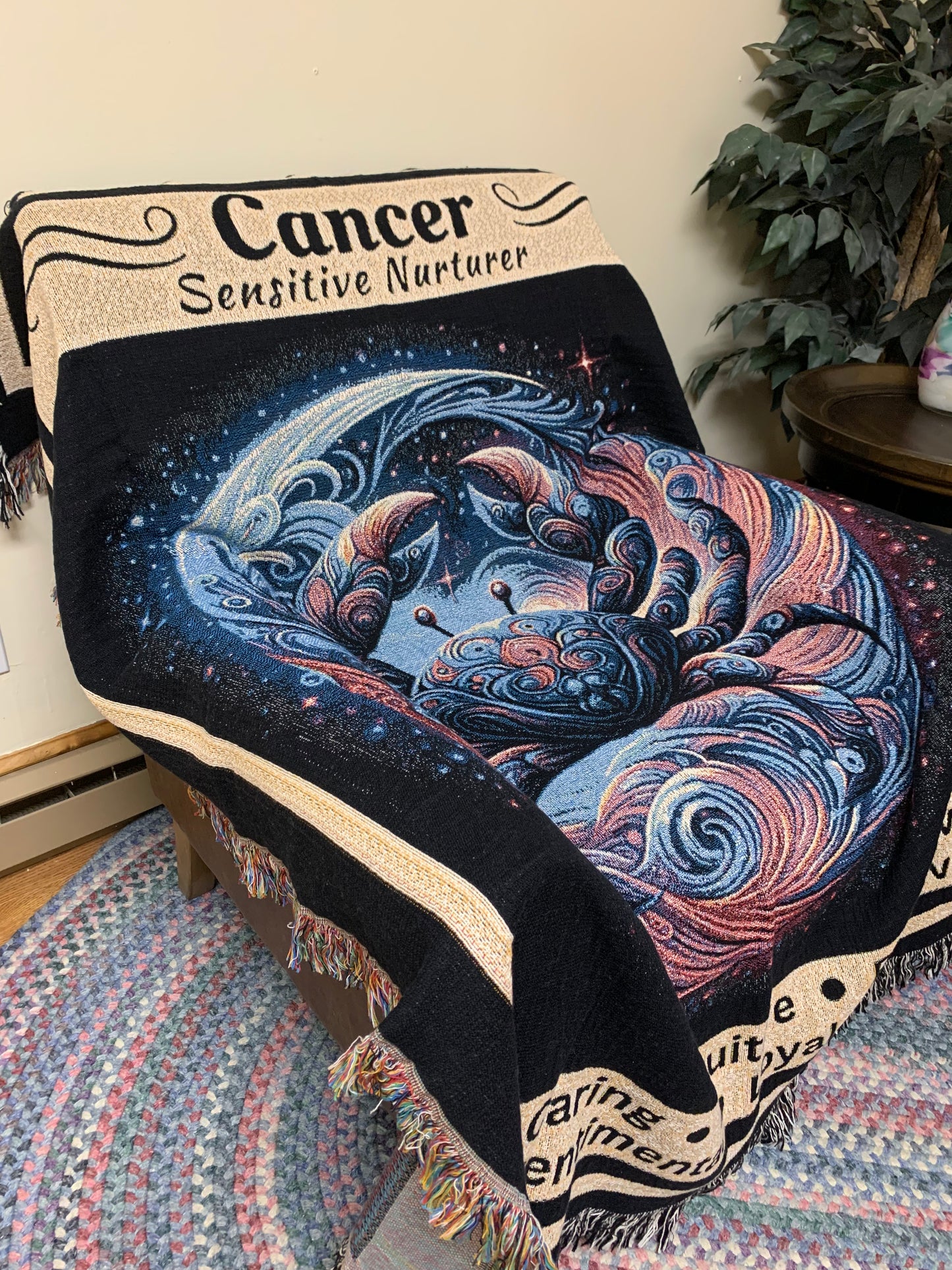 Cancer Zodiac Sign Heirloom Blanket on leather chair_Mister Obtuse